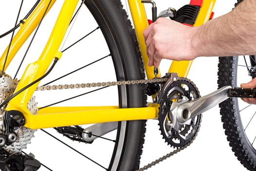 bicycle mechanic working on yellow mountain bike