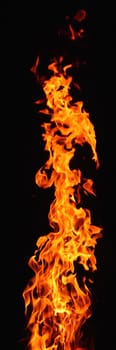 Jet flame in front of black background