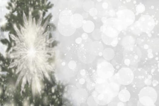 Abstract christmas tree bokeh background. Abstract blurred festive winter xmas backdrop texture with shiny silver and white bokeh snow lights. Space. Card concept.
