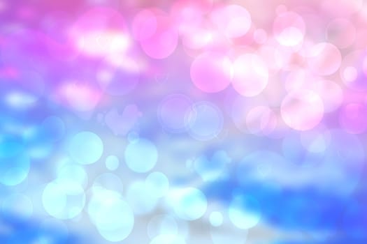 Abstract blue and pink blurred pastel background texture with glitter defocused bokeh lights. Beautiful texture.