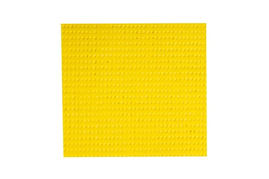 Household cleaning cloth. Closeup of bright yellow viskose cleaning rag isolated on a white background. Top view.