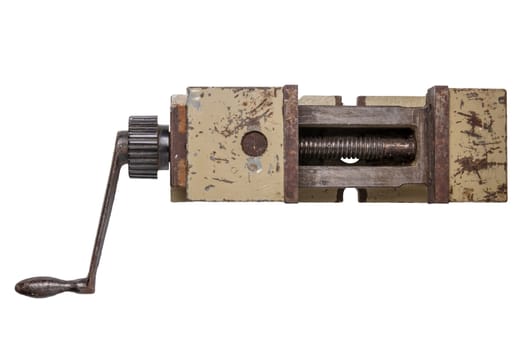 Tools isolated. Vise. Top view on large metal heavy industrial vise with screw mechanism and handles isolated on a white background. A old and rusty machine vise suitable for montage on a drill press.