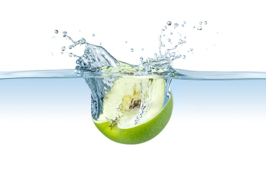 half green apple splashes into water