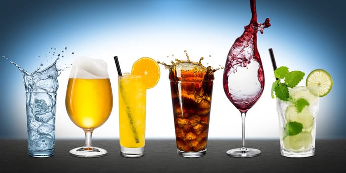 Row of various drinks on blue background