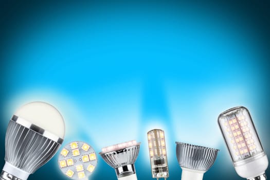 different led light bulbs on blue background