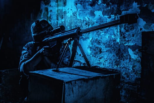 Army sniper night ambush in ruined building. Marine rifleman aiming with optical opscore and shooting in darkness with large caliber, anti-materiel sniper rifle. Secret military mission, urban warfare
