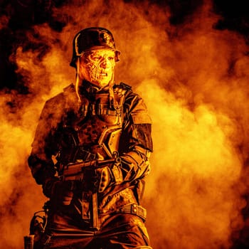 Ugly face of Futuristic nazi soldier in gas mask and steel helmet. Skin burned by atomic flame