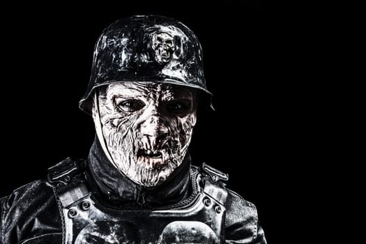 Ugly face of Futuristic nazi soldier in gas mask and steel helmet. Skin burned by atomic flame