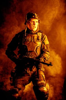 Ugly face of Futuristic nazi soldier in gas mask and steel helmet. Skin burned by atomic flame
