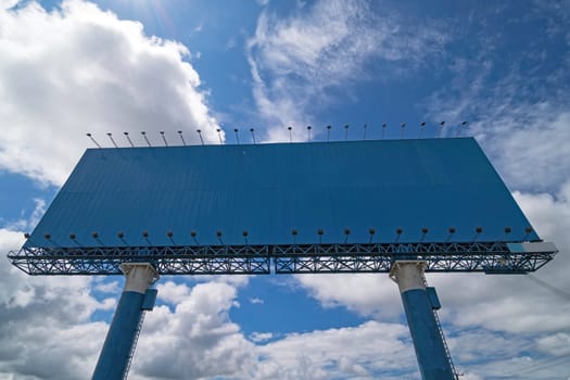 Advertisement with copy space at landscape with sky and clouds