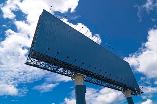 Advertisement with copy space at landscape with sky and clouds