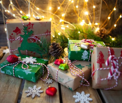 Little wrapped presents and festive lights for a Merry Christmas / Happy Holidays