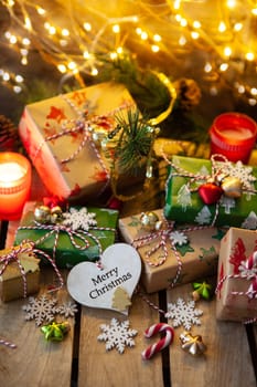 Little wrapped presents and festive lights for a Merry Christmas / Happy Holidays