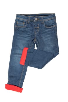 Fashionable lined Thermojeans. Trendy warm stretch blue jeans trousers isolated on white background. Fashionable jeans for child boy. Winter jeans fashion.