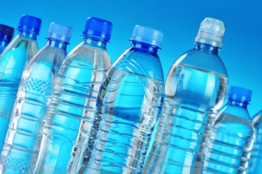 Composition with assorted plastic bottles of mineral water