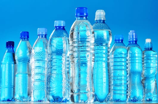 Composition with assorted plastic bottles of mineral water