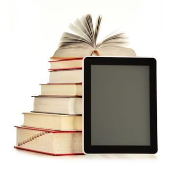Composition with books and tablet computer isolated on white background