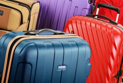 Composition with colorful travel suitcases.