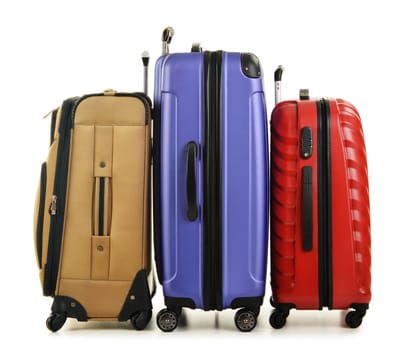 Three suitcases isolated on white background