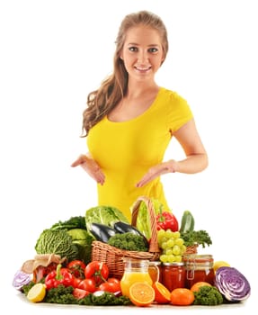 Young woman with assorted grocery products isolated on white background