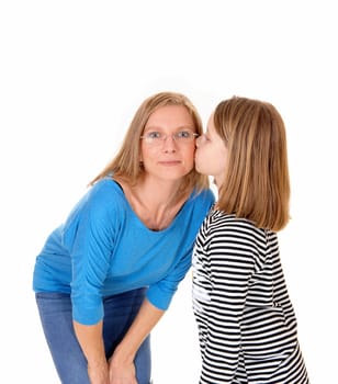 A young pretty girl kissing her mom on the chick, isolated for.white background..