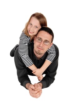 A lovely young girl lying on the back of her daddy, isolated for.white background..