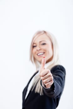 thumbs up succesful woman and smile with a blue jacket