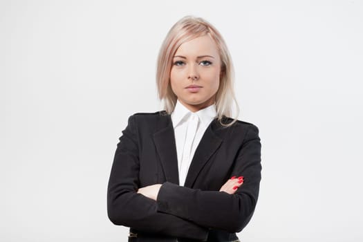 crossed arms self confident blonde woman