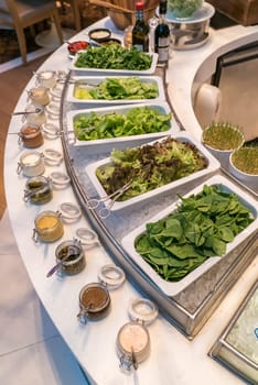 Salad bar station in buffet line