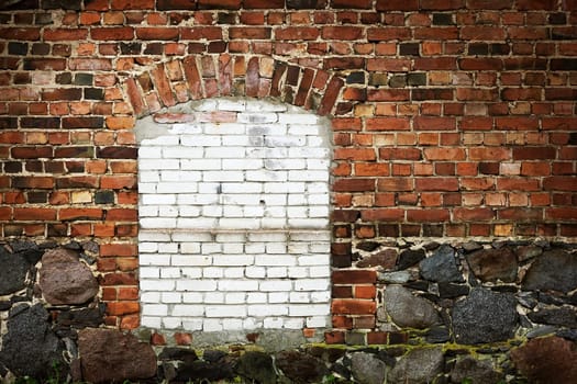 Old red brickwall texture with broken bricks