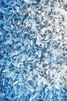 Ice pieces on the ground in winter
