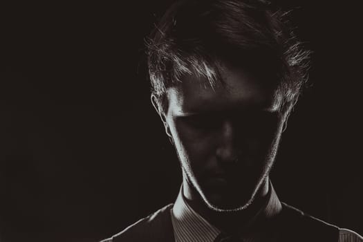 Dramatic portrait. Black background