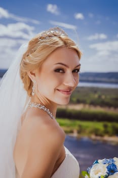 Young bride in white wedding dress