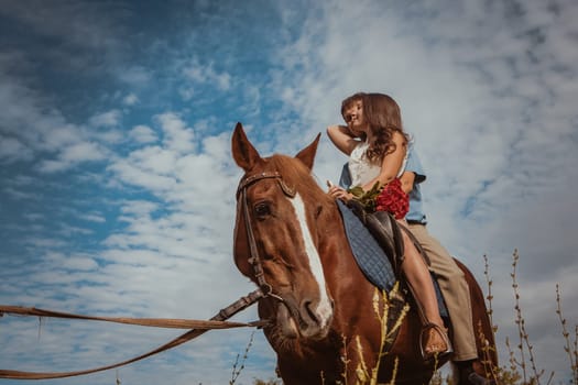 Young beautiful couple with a horse. Filtered. Selective focus.
