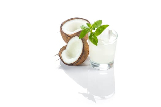 Pinacolada drink with mint leaf on white background