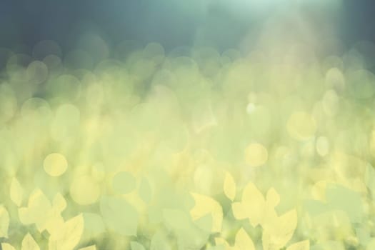 Abstract green lightening bokeh circles and leaves from underwater bubbles. Beautiful green texture.