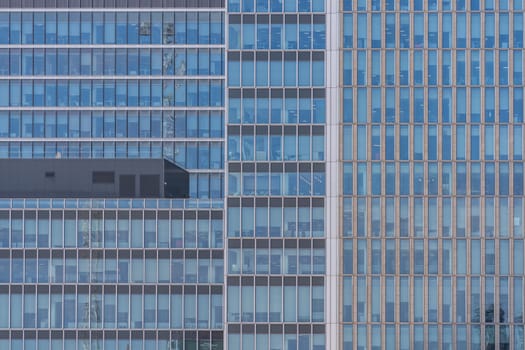 Modern and contemporary office building from glass and steel using for background