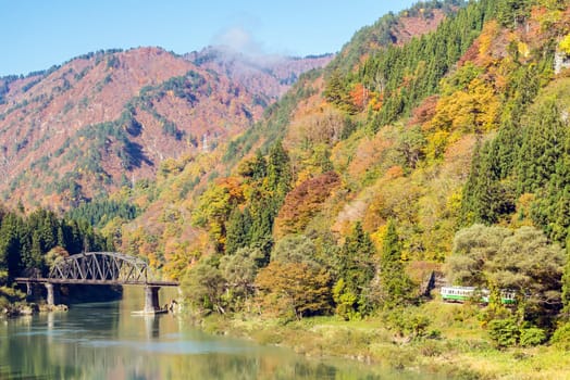 Autumn fall foliage Fukushima Tadami Black Bridge View Point in Fukushima Japan