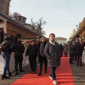 TURIN, ITALY - CIRCA DECEMBER 2018: People at Christmas market