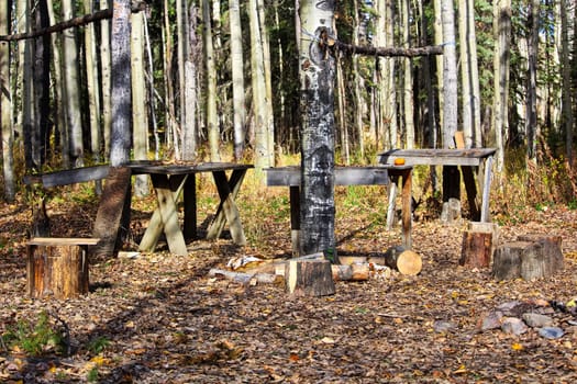 Tables and poles setup at a popular hunting camp spot.