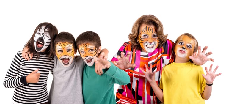 Children's group and grandmother all with animal face-paint isolated in white