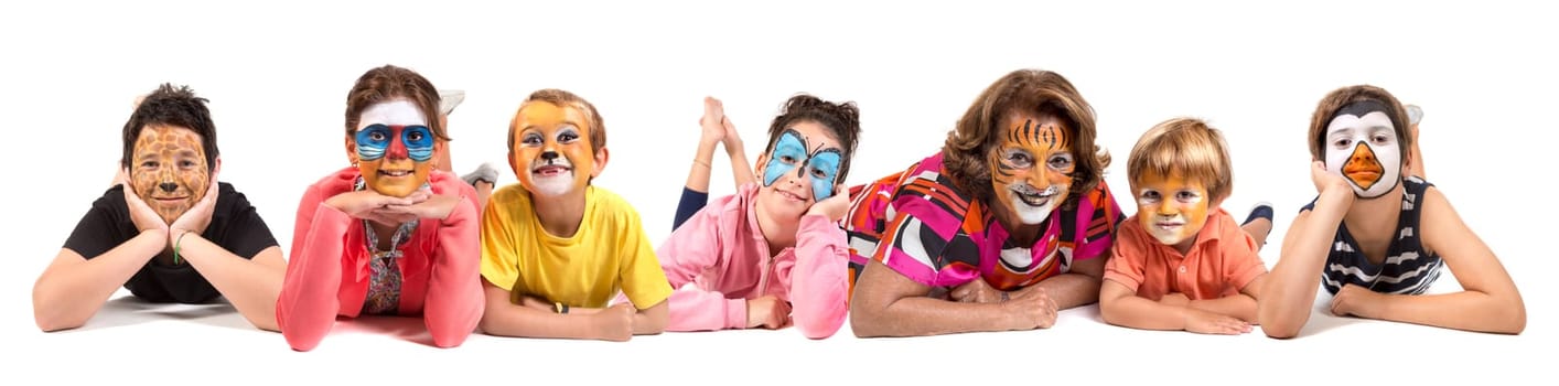 Children's group with granny and animal face-paint isolated in white