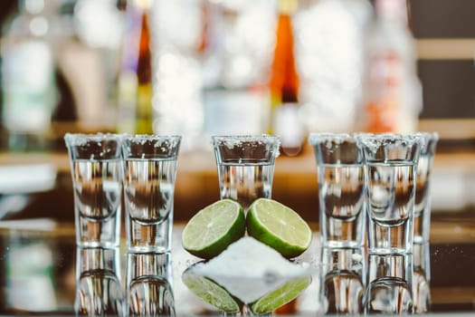 Red cocktail in shot glasses