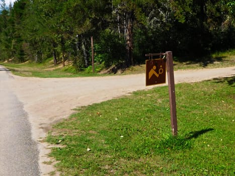 Sign to Indicate Tennis Courts Down Side Road.