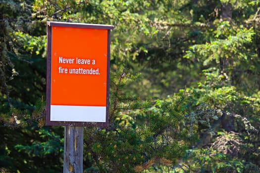 Never leave a fire unattended sign.
