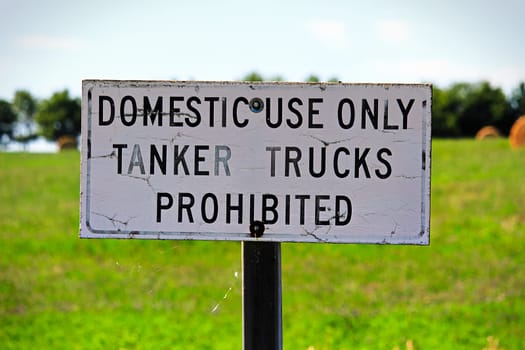 Domestic Use Only Tanker Trucks Prohibited sign.