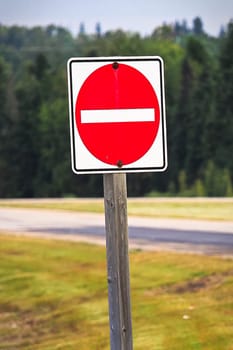 Closeup of a Do Not Enter sign on a highway.