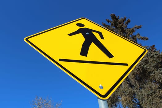 Crosswalk on a Yellow Diamond Sign