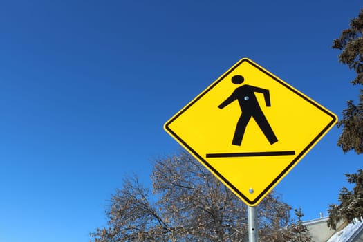 Crosswalk on a Yellow Diamond Sign