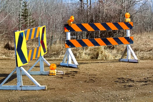 A construction and detour sign blockage.